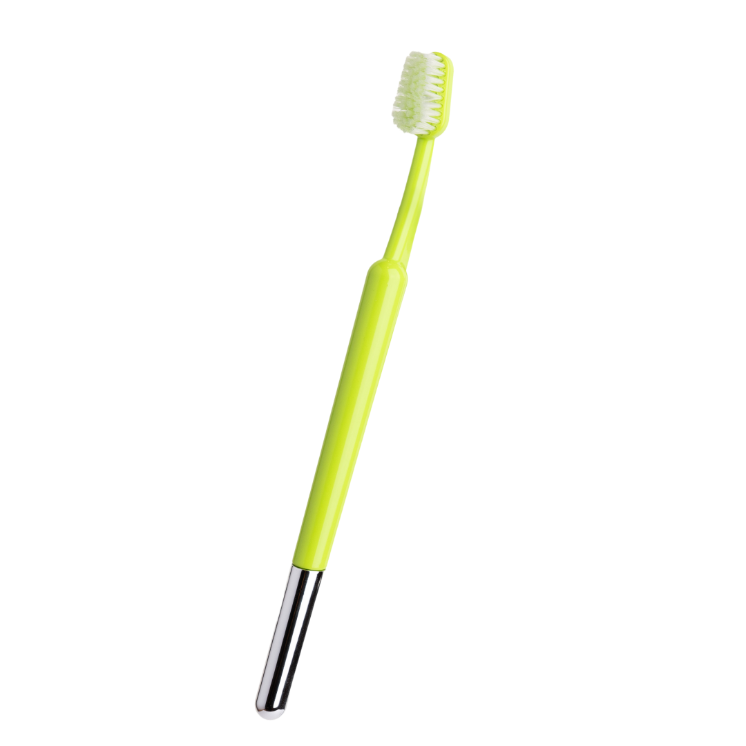 Tortoiseshell-patterned toothbrush with white bristles.