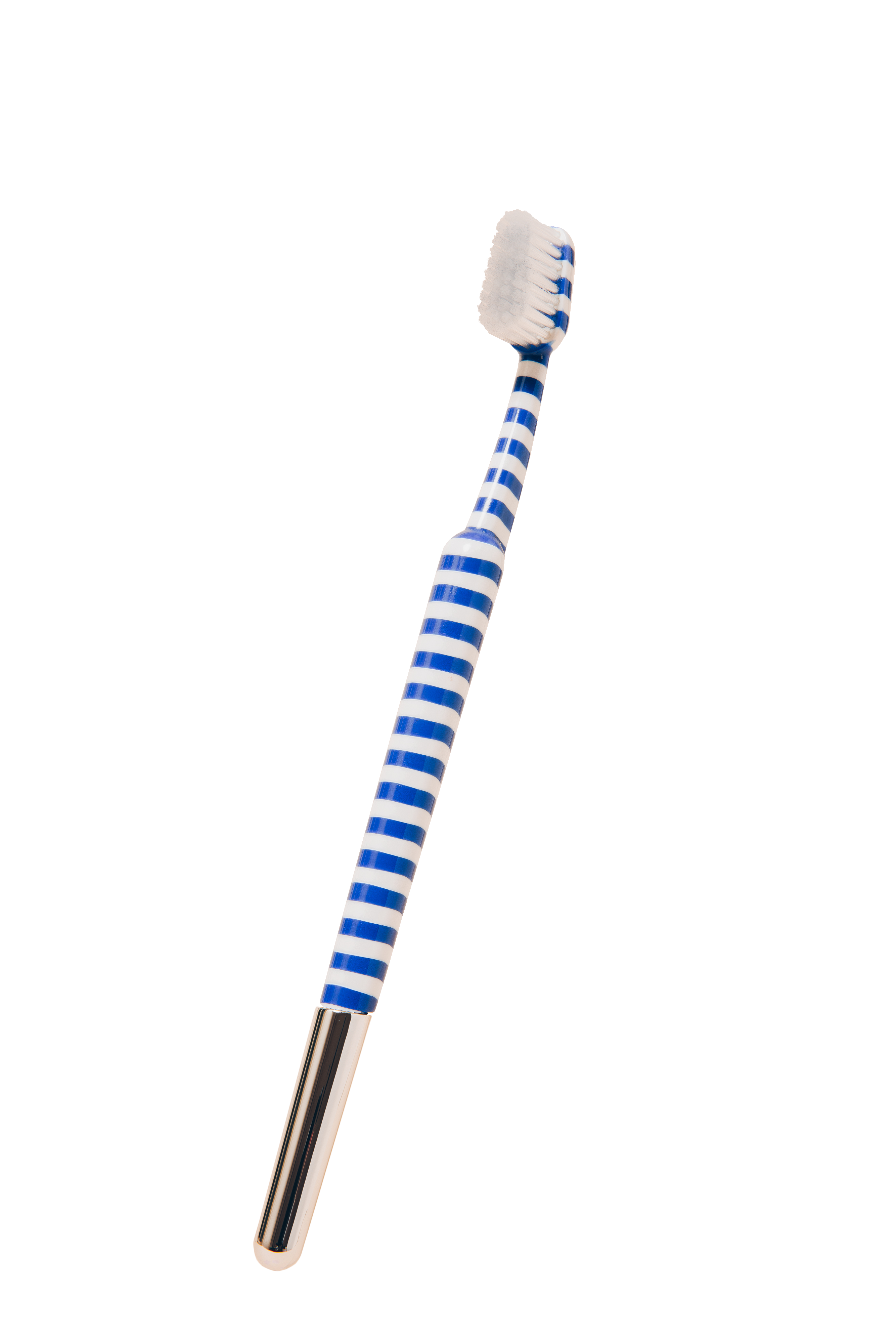 Tortoiseshell-patterned toothbrush with white bristles.